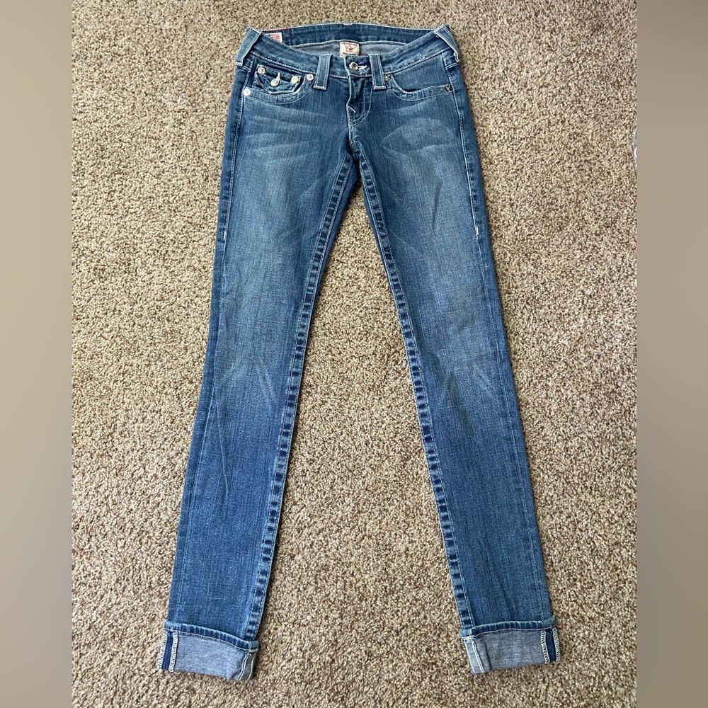 EUC! True Religion skinny dark wash w/rhinestone button & on back pocket flaps.